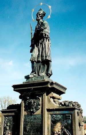 A statue of St Nepomucene on the Charles Bridge, Prague